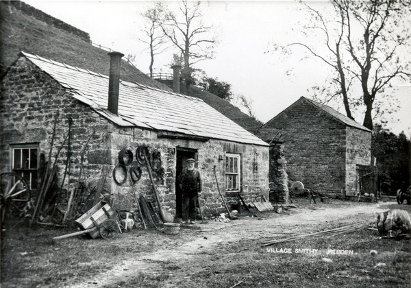 Postcard of William Bell of Hebden taken outside his smithy